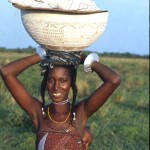 Woman and baby. Foge Island, Nigeria, May 1968. Foge Island was soon to be submerged by the construction of the Kainji Dam and the creation of Kainji Lake.