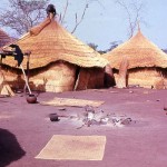 Constructing new huts or houses in the village of Kouande-Guessou, Republic of Benin, 30 March 1964. Benin, or Dahomey as it was then called, lies to the west of Nigeria.