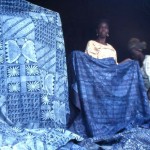 Adire cloth for sale in Dugbe market, Ibadan. Adire, which translates as tie and dye, is the name given to indigo dyed cloth produced by Yoruba women of south western Nigeria. 1977.