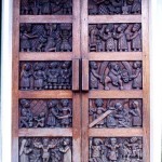 Another set of doors of the Catholic Church, this time with carved wooden panels. 1979.