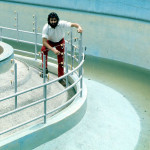 Showing the design of the moat. The inner section, to which the apes had access, had a roughened floor plus three raised ridges to provide a foot/hand hold if needed; the gradient and depth had been carefully researched and assessed. After a few very minor modifications, the moat worked perfectly as a gorilla and chimp barrier, with the physical barrier below, and the electrified barrier above, water. This photo was taken a year or so after construction when we emptied the moat for cleaning.