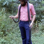 I am holding a black cobra (Naja melanoleuca) that was captured and killed on the University of Ibadan campus, 11 October 1972. It measured 8 ft. 4 in. in length and weighed 8 lb. 1 oz.